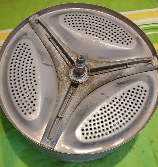 Clean back of the washing machine drum